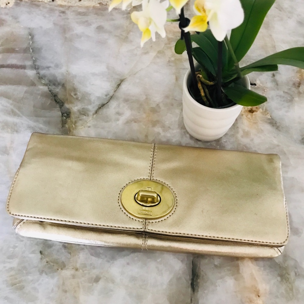 Gold Coach foldover clutch